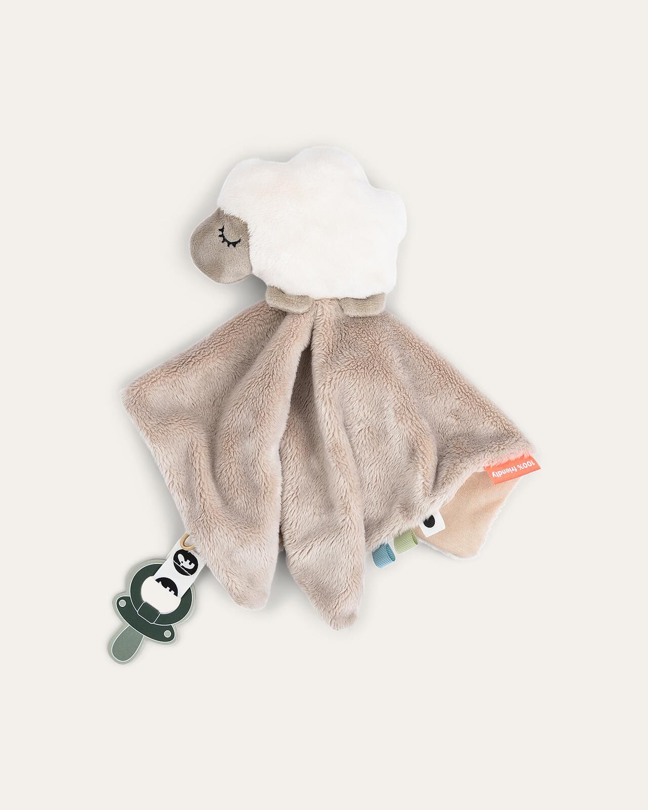 Een pluchen schapenknuffeldoek met een beige lichaam, witte kop en een aangehechte groene speenclip.