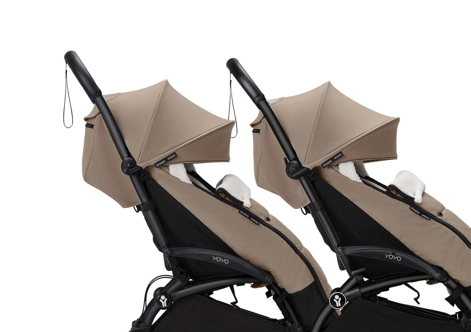 Two beige YOYO strollers with black frames and white faux fur lining.