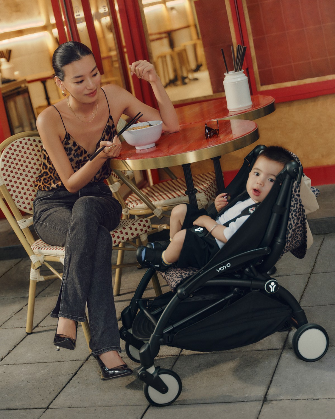Baby in a YOYO stroller at a restaurant