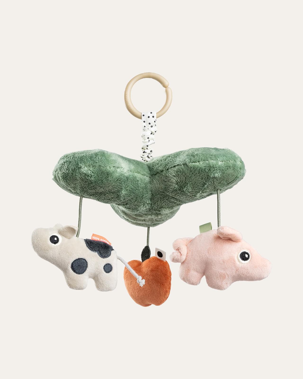 muzikaal draaispeeltje Pluche babymobiel met een groen blad, hangende koe-, appel- en varkensspeeltjes.