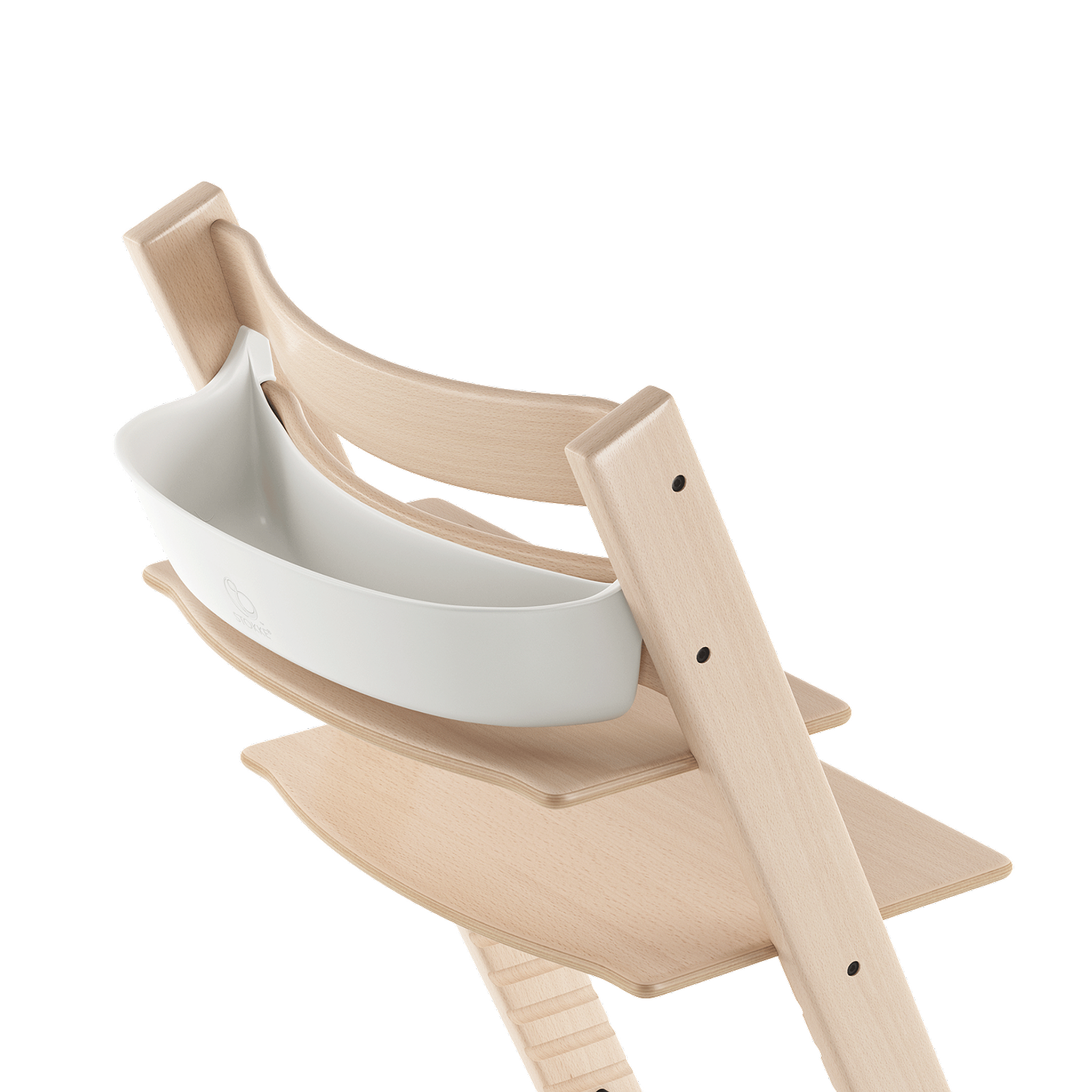 Hochstuhl Tripp Trapp aus Naturholz mit weißem Newborn Set.