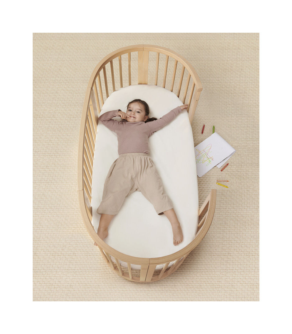 Stokke Sleepi Bed, Hazy Grey - Oval Crib Suitable for Ages 0-5 Years Old -  Adjustable, Stylish & Flexible - Sturdy Beech Wood Frame
