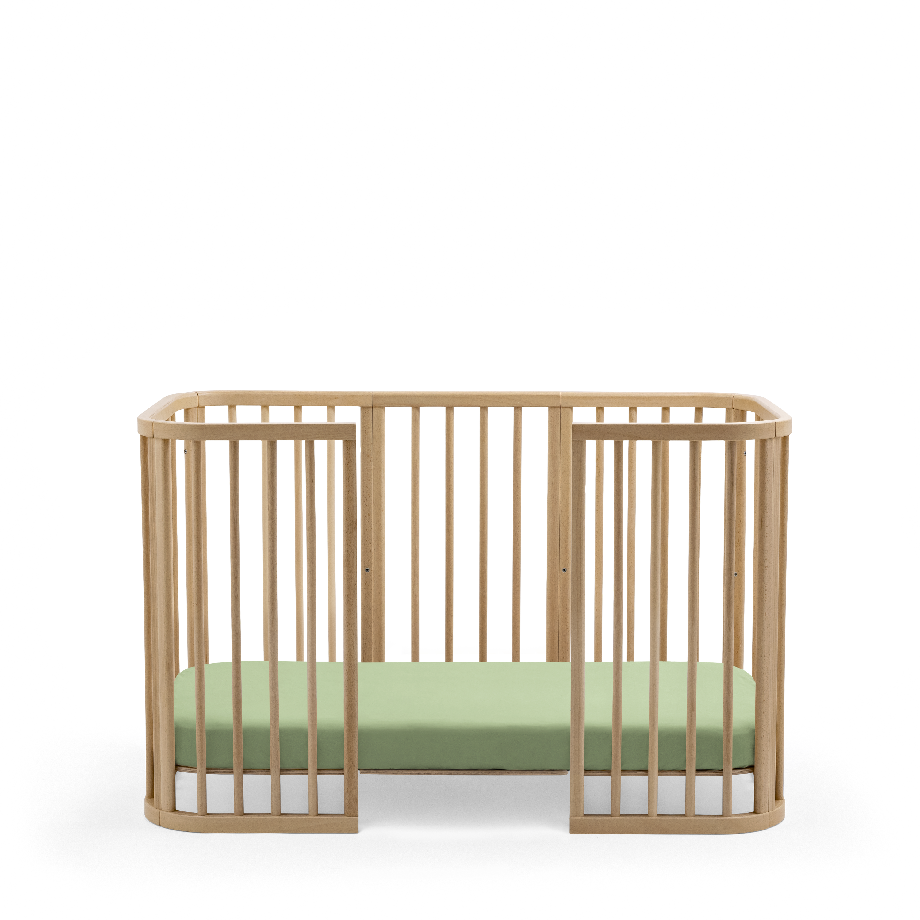 Stokke® Nighti™ Toddler config 2. Natural. Fitted Sheet Sage Green. Profile view. galery image 3