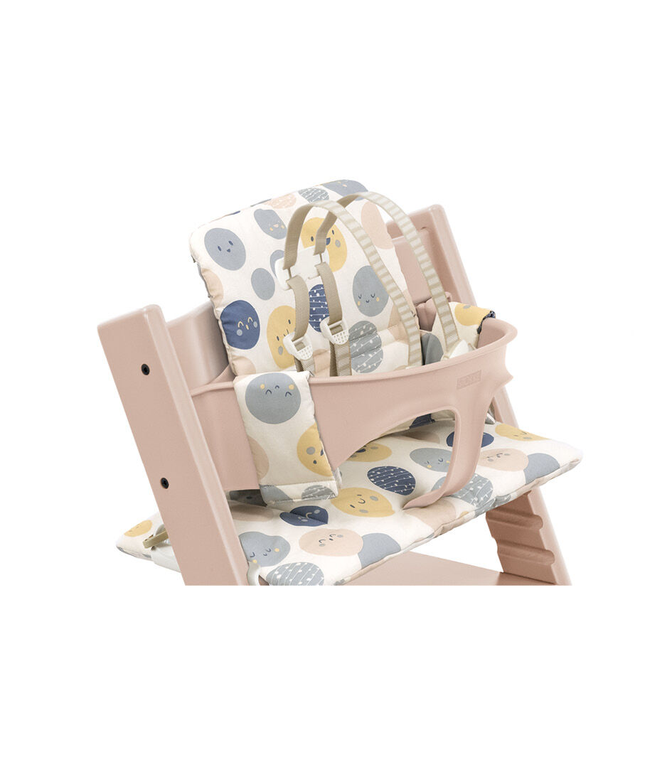Tripp Trapp® High Chair Serene Pink, with Baby Set and Classic Cushion Soul System. US version with Harness. Close-up.