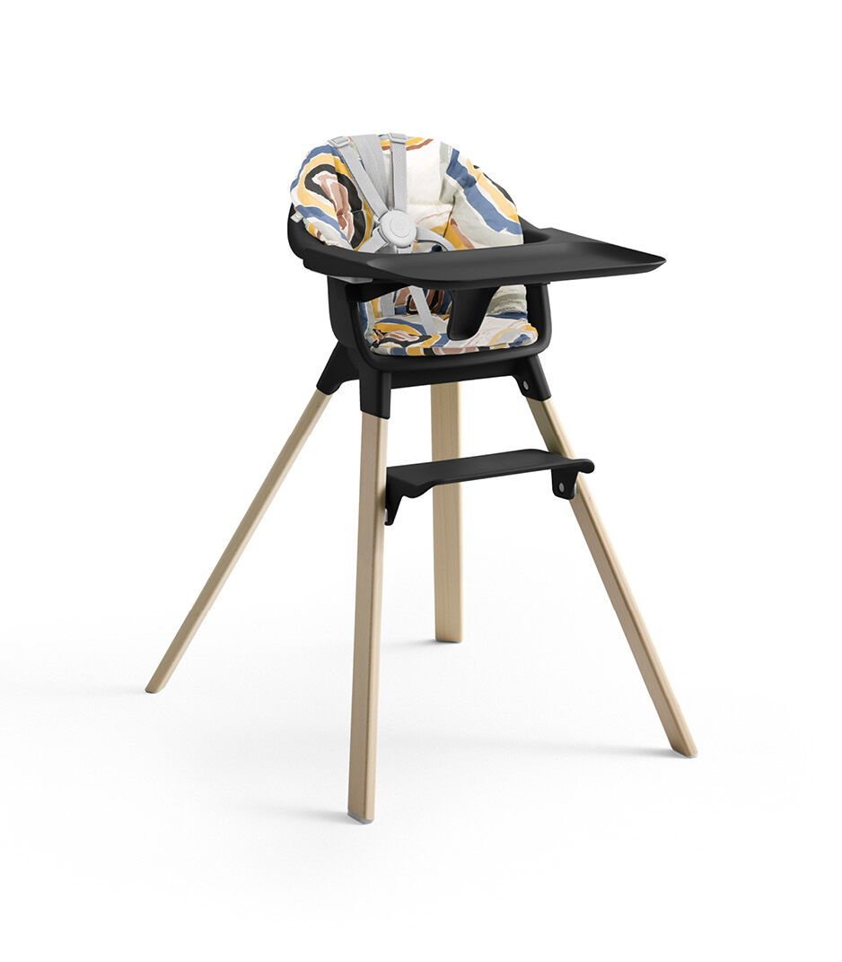 Stokke® Clikk™ High Chair with Tray and Harness, in Natural and Black. Cushion Multi Circle.