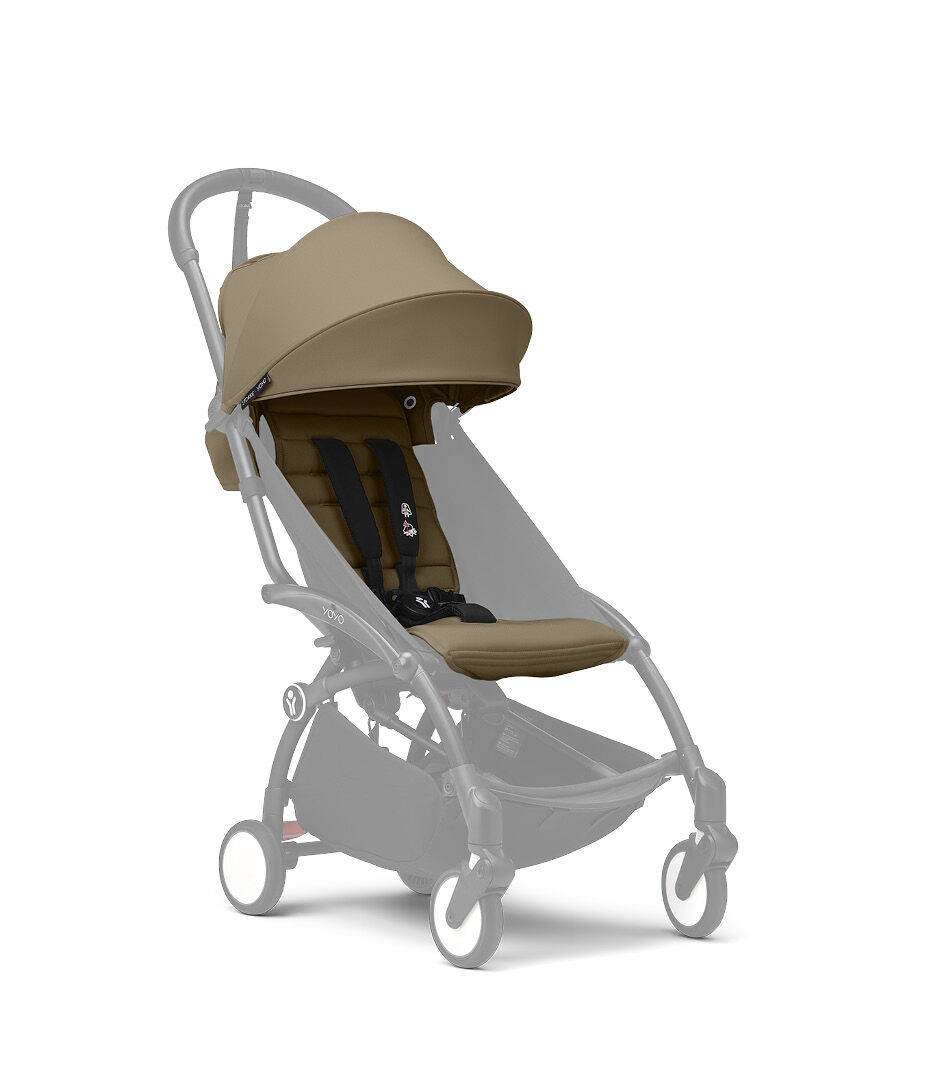 Stokke® YOYO3® 6+ Toffee. White Frame. Shadowed frame.