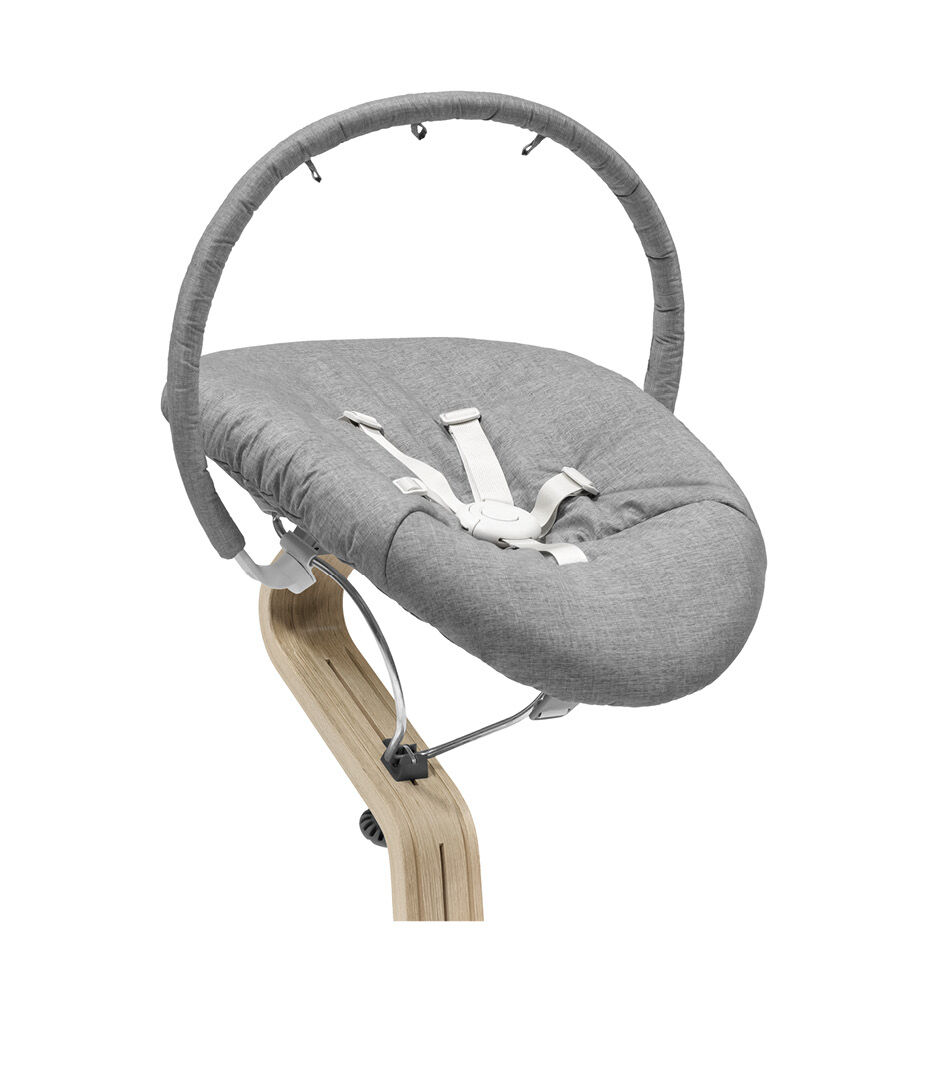Stokke® Nomi® Chair Natural with Newborn Set Grey.