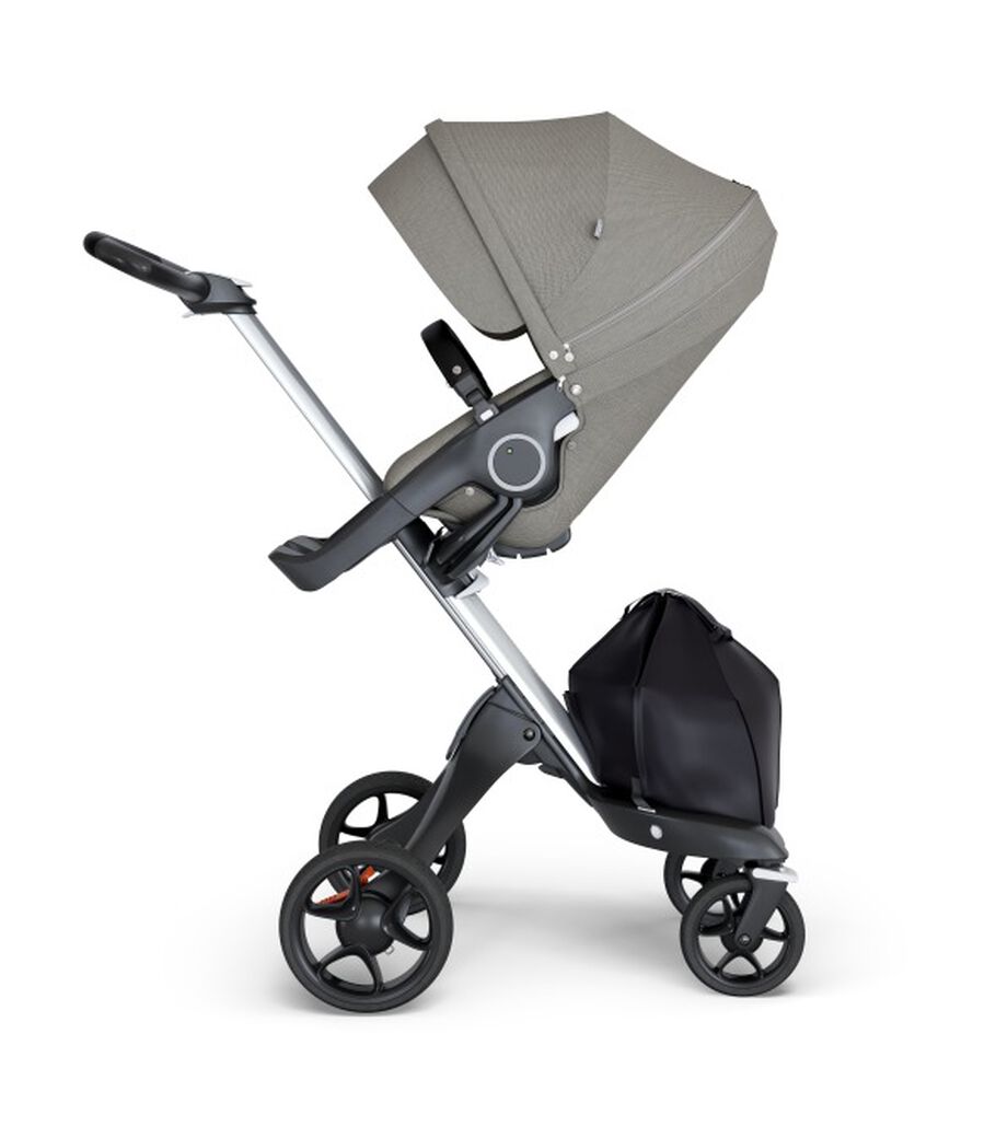 Stokke® Xplory® wtih Silver Chassis and Leatherette Black handle. Stokke® Stroller Seat Seat Brushed Grey. view 7