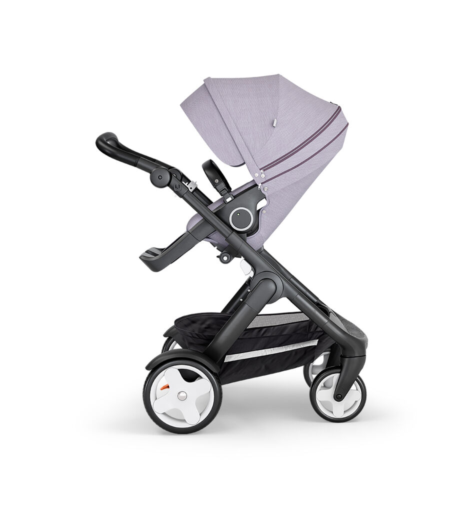 Stokke® Trailz™ with Black Chassis, Black Leatherette and Classic Wheels. Stokke® Stroller Seat, Brushed Lilac view 18