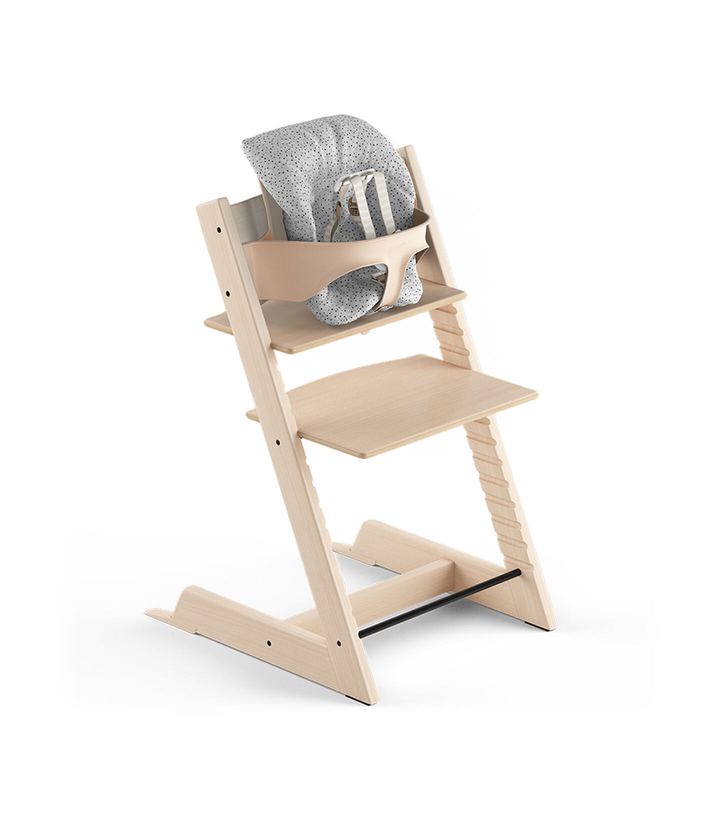 Tripp Trapp® Natural, Beech. With Tripp Trapp® Baby Set and Baby Cushion Cloud Sprinkle. US version with Harness. Tripp Trapp® Natural, Beech. With Tripp Trapp® Baby Set and Baby Cushion Cloud Sprinkle. US version with Harness.
