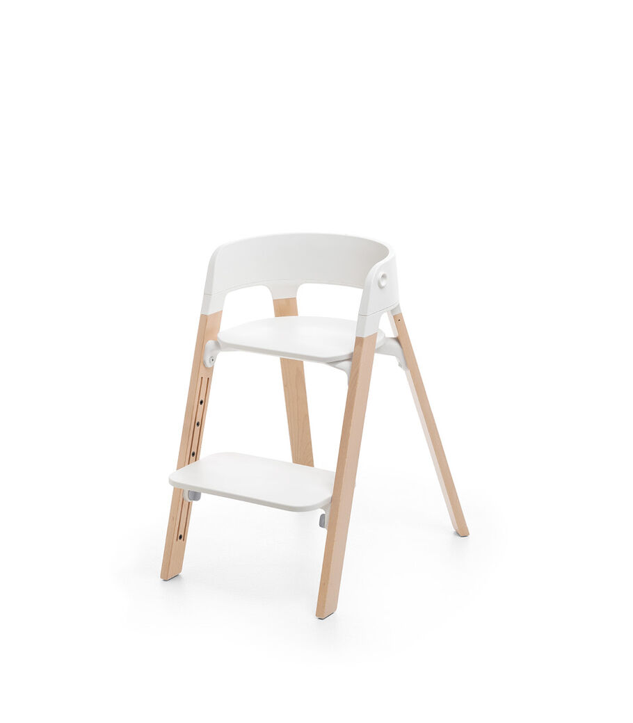 Stokke® Steps™ Chair, Beech Natural with White Seat. Footrest low. view 5