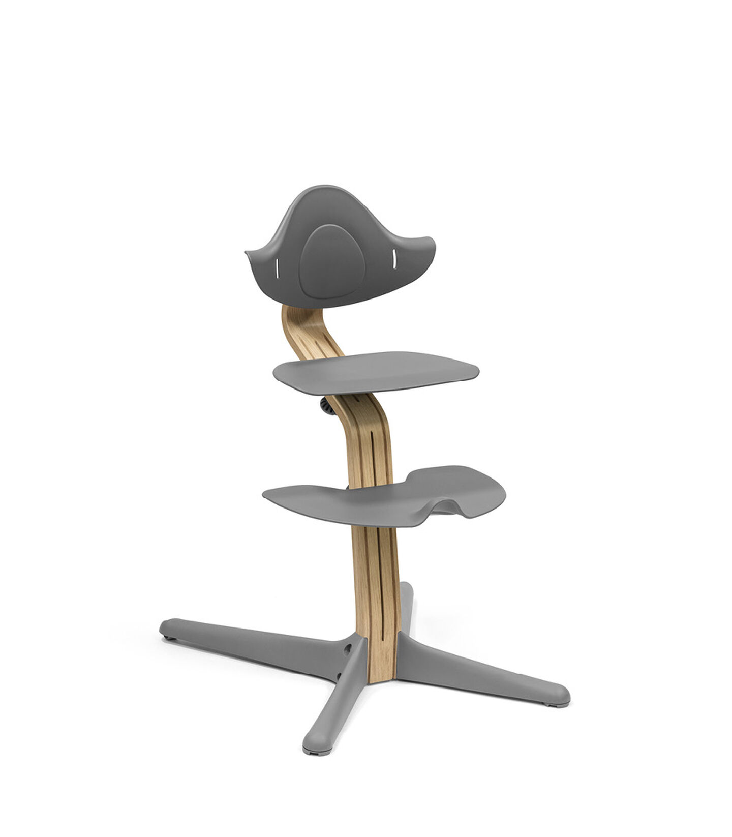 Stokke® Nomi® Chair. Premium Oak wood and Grey plastic parts.  view 1
