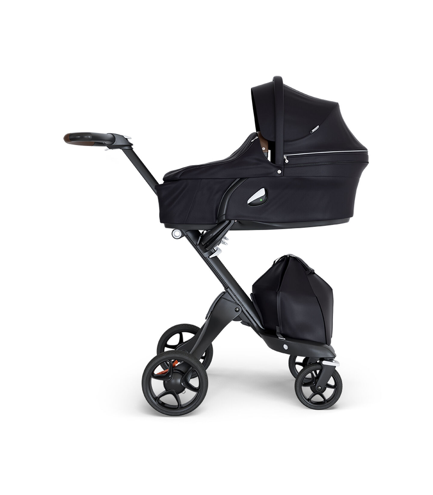 Stokke&reg; Xplory&reg; wtih Black Chassis and Leatherette Brown handle. Stokke&reg; Stroller Carry Cot Black.