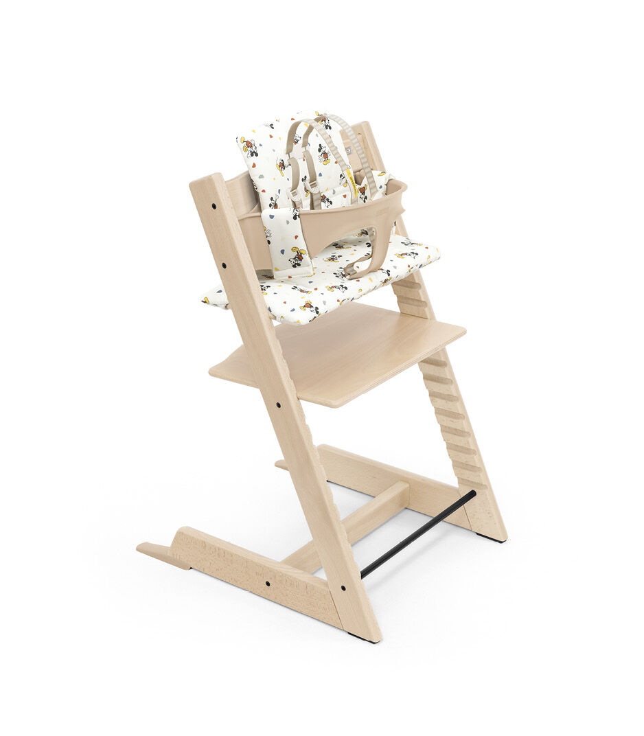 Tripp Trapp® chair Natural, with Baby Set and Classic Cushion Disney Mickey Celebration. US variant. Limited Edition.