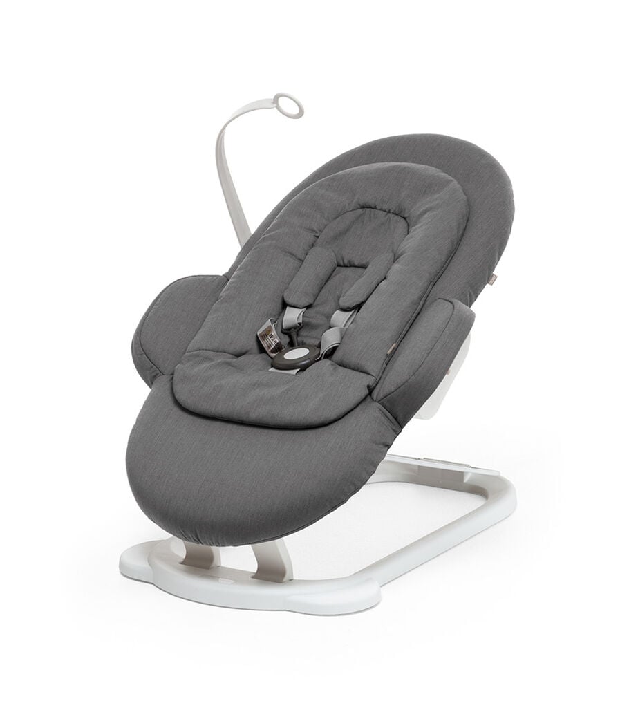 Stokke® Steps Bouncer in Deep Grey with White Base and Toy Hanger. view 8