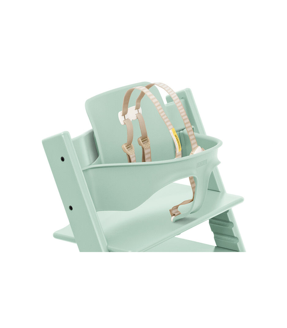 Tripp Trapp® Chair Soft Mint with Baby Set. Close-up. US with Harness.
