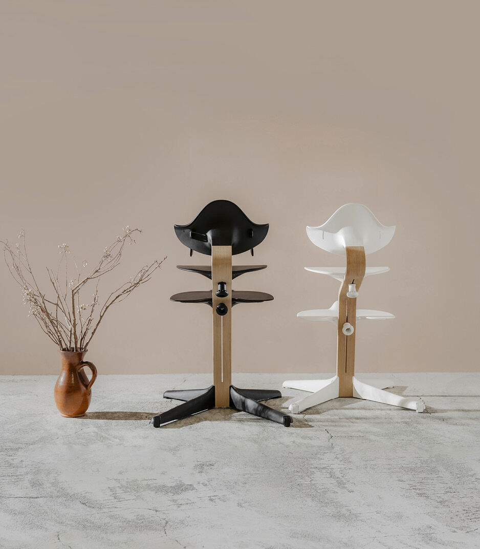 Stokke® Nomi® Chair. Oak premium wood, Black and White plastic parts. Styled. galery image 15