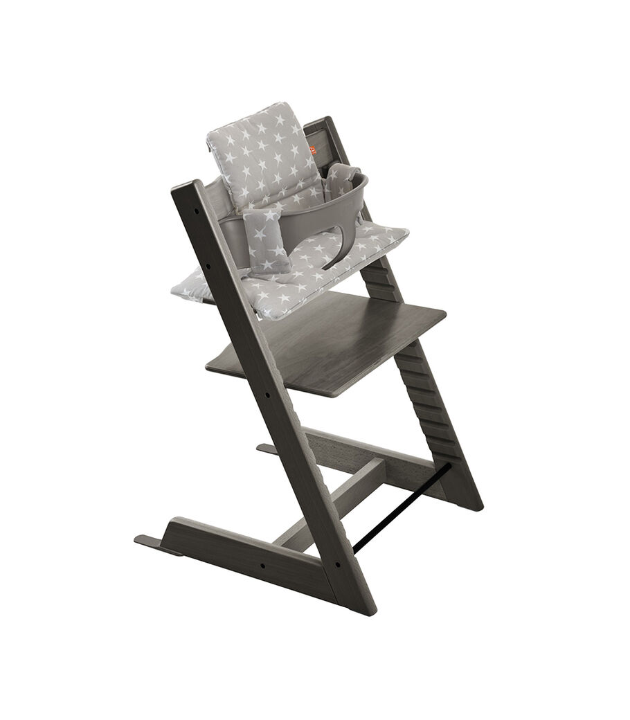 Tripp Trapp&reg; Hazy Grey with Baby Set and Grey Stars Cushion.