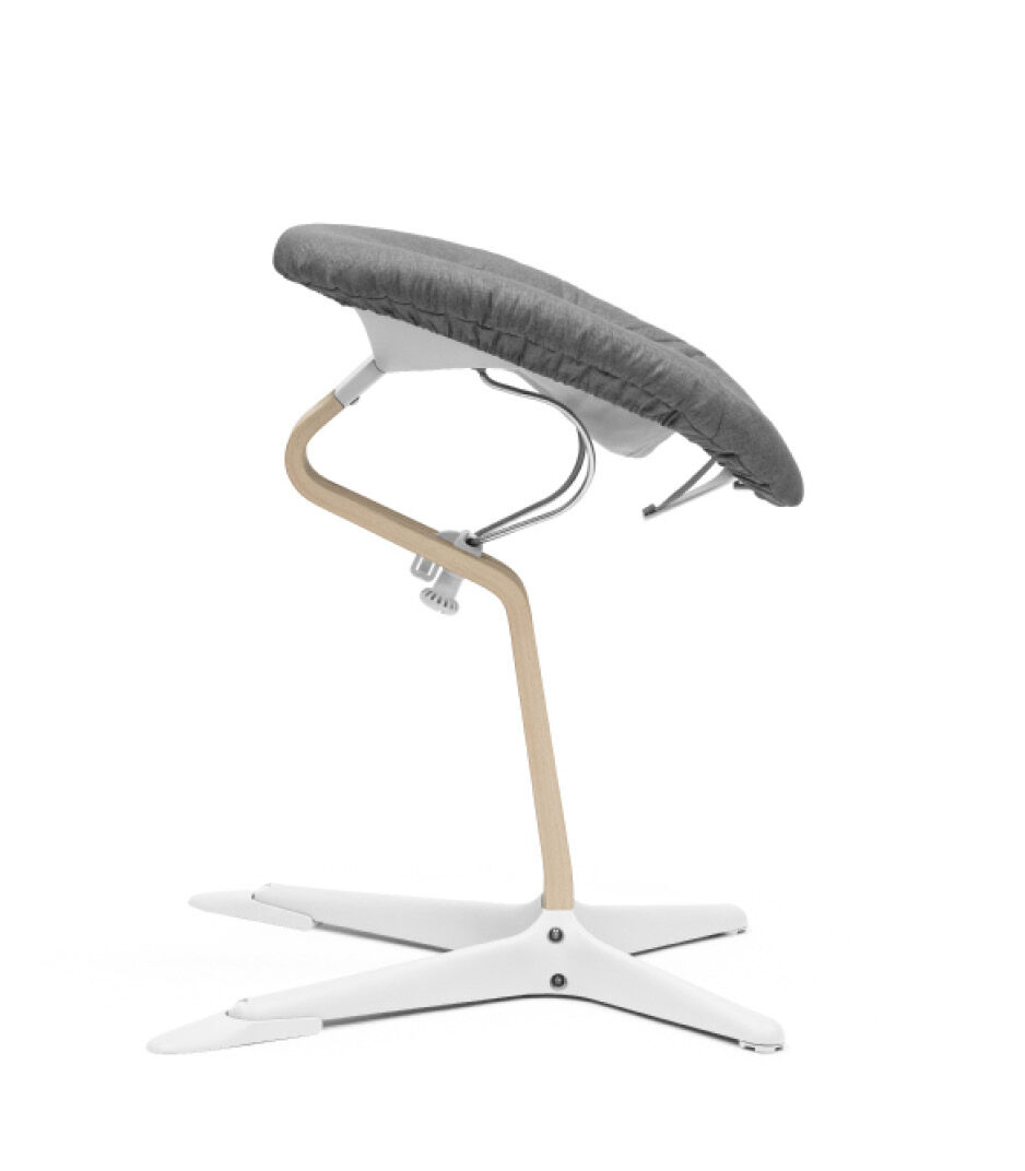 Stokke® Nomi® Chair Natural-White with Newborn Set White and Grey textile set. Active position. US variant. galery image 8