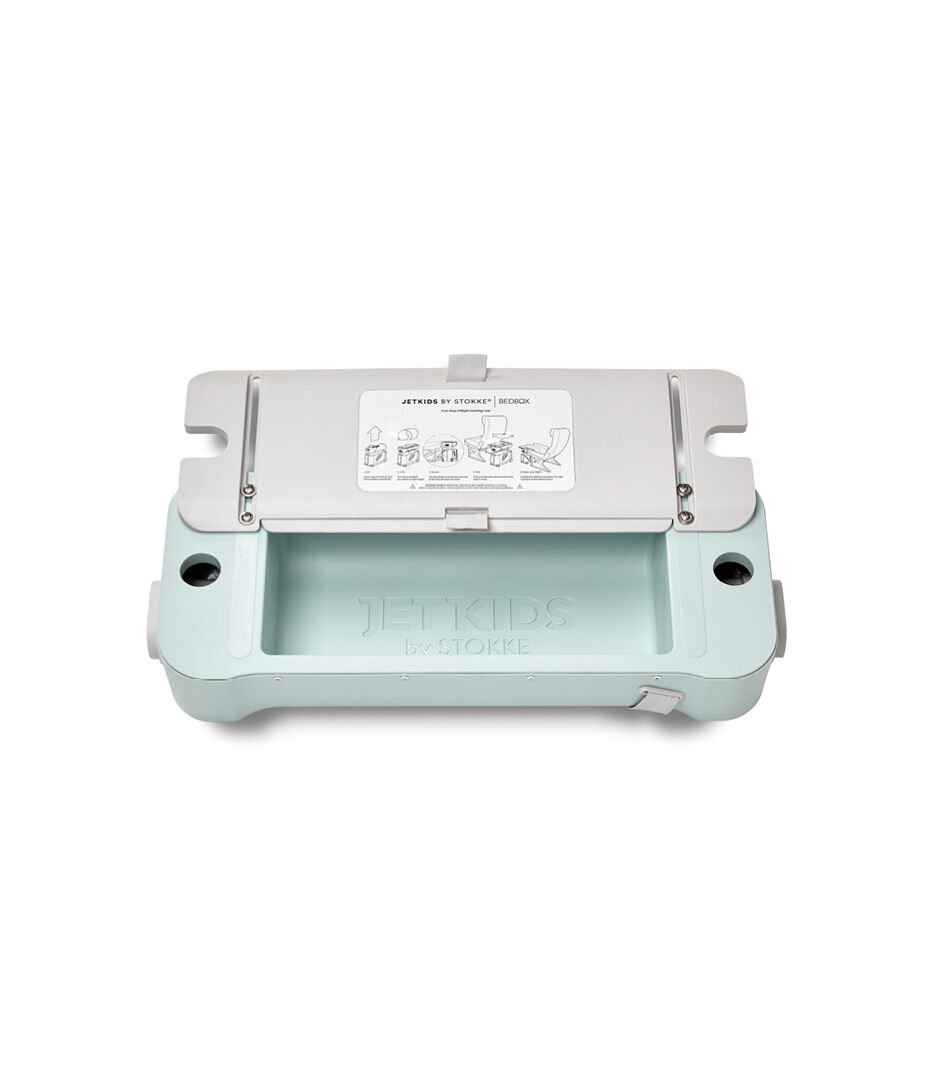 JetKids by Stokke® RideBox Green Aurora. Lid with extendable plate, open.