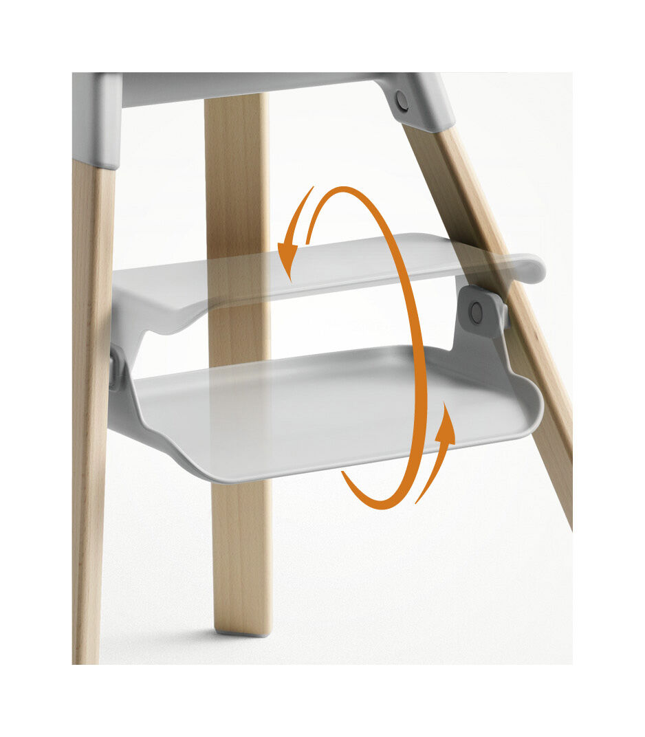 Stokke® Clikk™ High Chair Natural and Cloud Grey. Detail, footrest rotation.