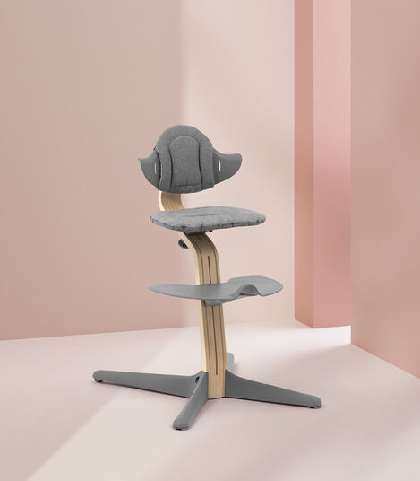 Stokke® Nomi® Chair Natural with Grey plastic parts and Grey cushion. view 2
