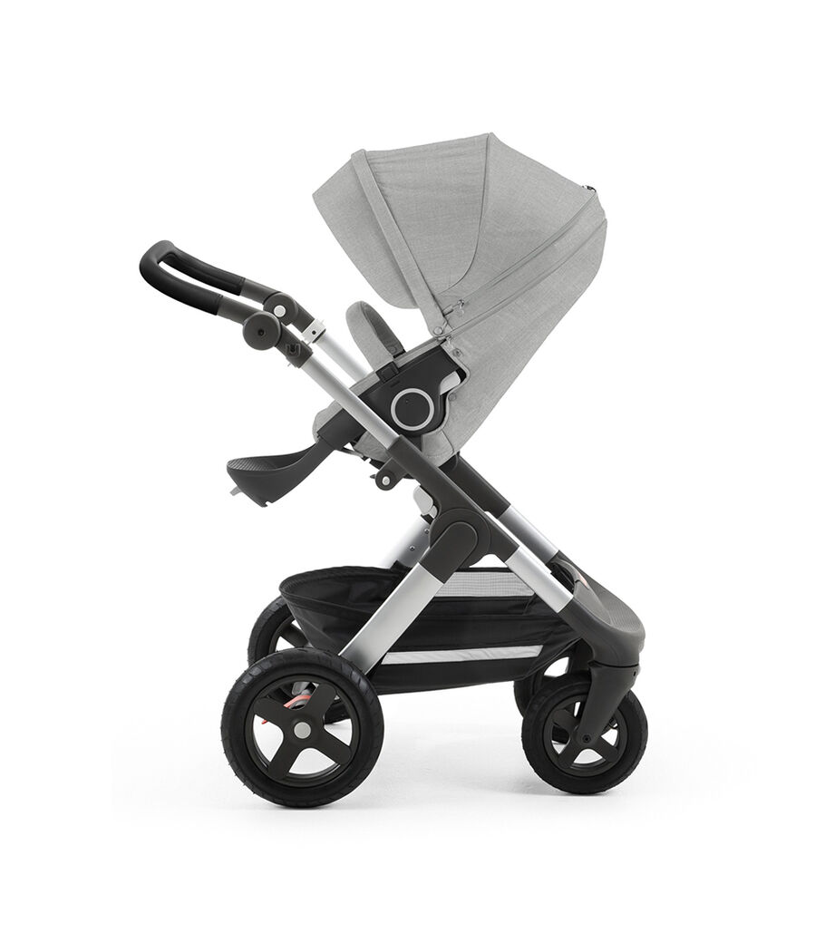 Stokke® Trailz™ with silver chassis and Stokke® Stroller Seat, Grey Melange. Leatherette Handle. Terrain Wheels. view 8