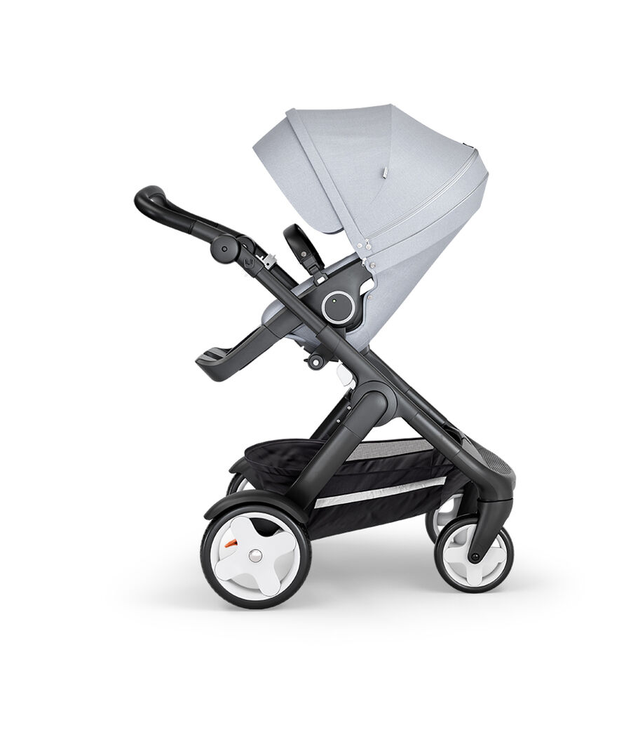 Stokke® Trailz™ with Black Chassis, Black Leatherette and Classic Wheels. Stokke® Stroller Seat, Grey Melange. view 2