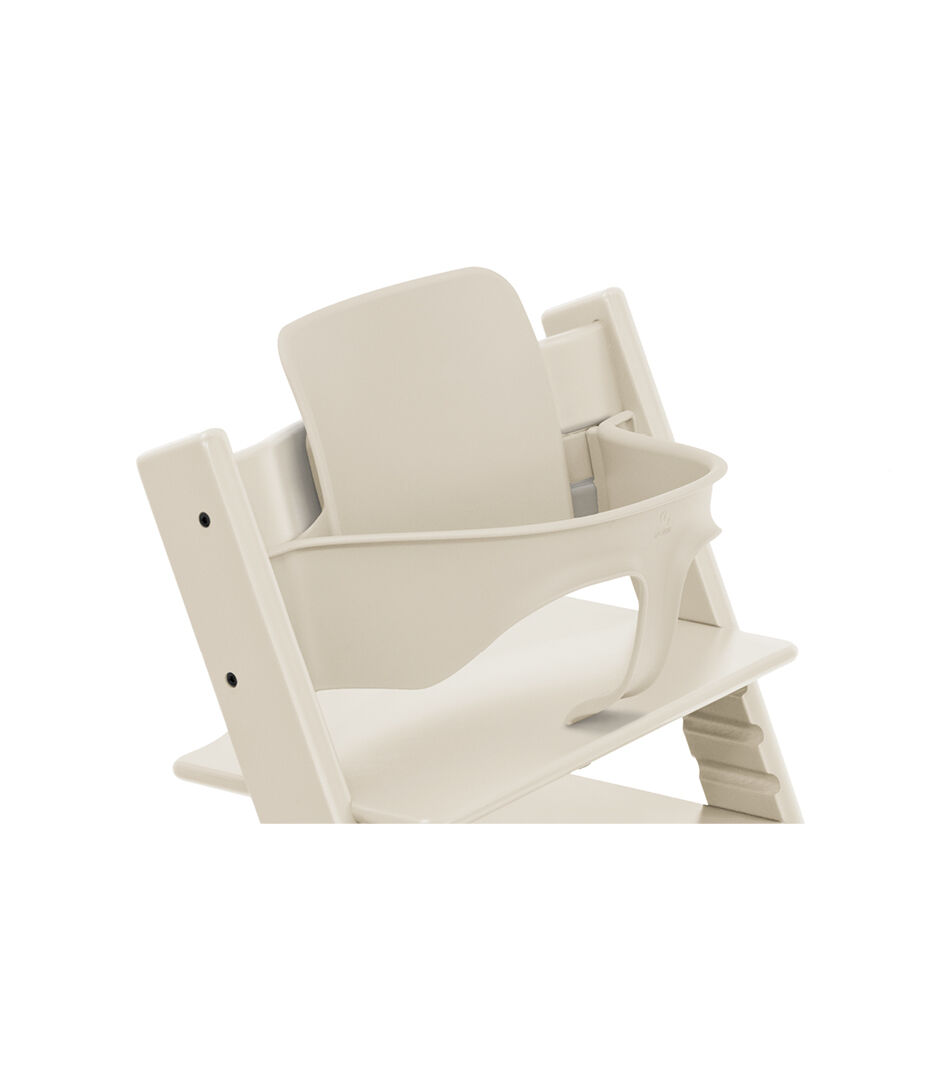 Tripp Trapp® chair Vanilla Whitel, Beech Wood, with Baby Set. Close-up.