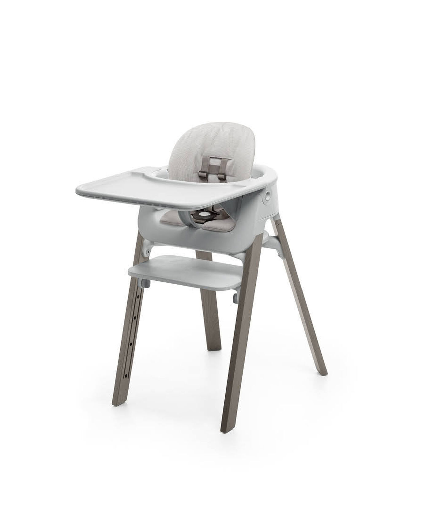 Stokke&reg; Steps&trade; Hazy Grey with Accessories. Baby Set Light Grey. Baby Set Cushion Timeless Grey. Baby Set Tray Light Grey.