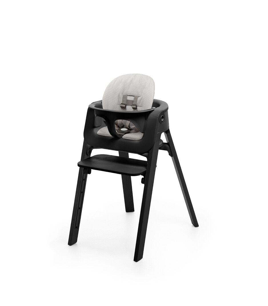 Stokke® Steps™ Black high chair. Baby Set Black with Timeless Grey Cushion.