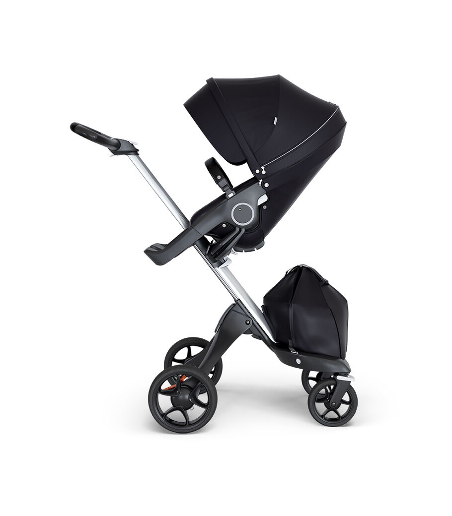 Stokke® Xplory® wtih Silver Chassis and Leatherette Black handle. Stokke® Stroller Seat Black. view 4
