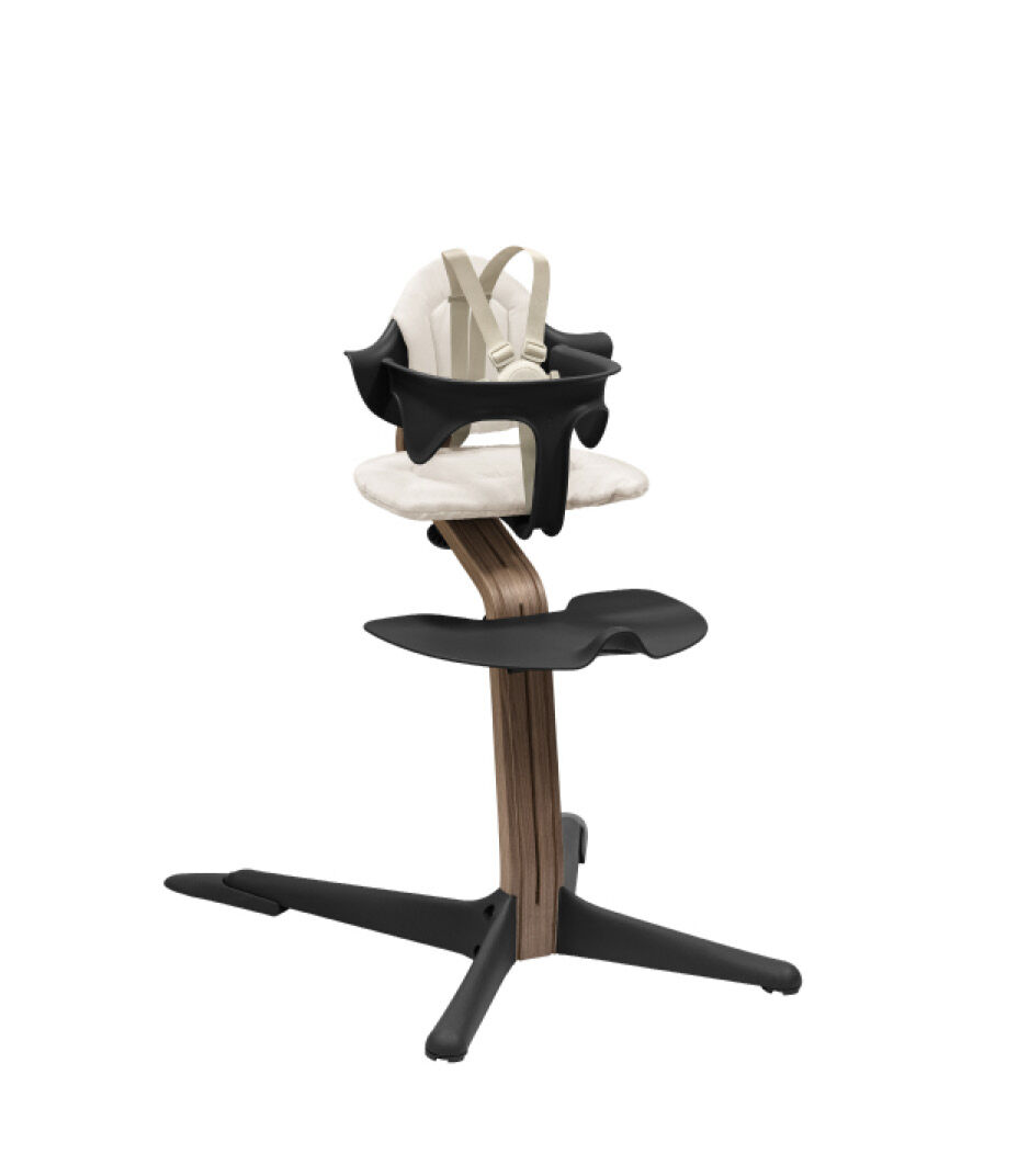 Stokke® Nomi® Chair. Walnut/Black. With Baby Set and Cushion Sand. US variant with Harness and Leg Extensions. galery image 11
