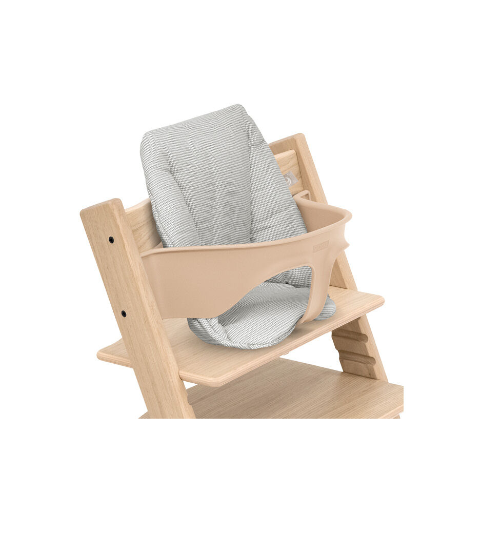Tripp Trapp® chair Oak Natural, with Baby Set and Baby Cushion Nordic Grey.