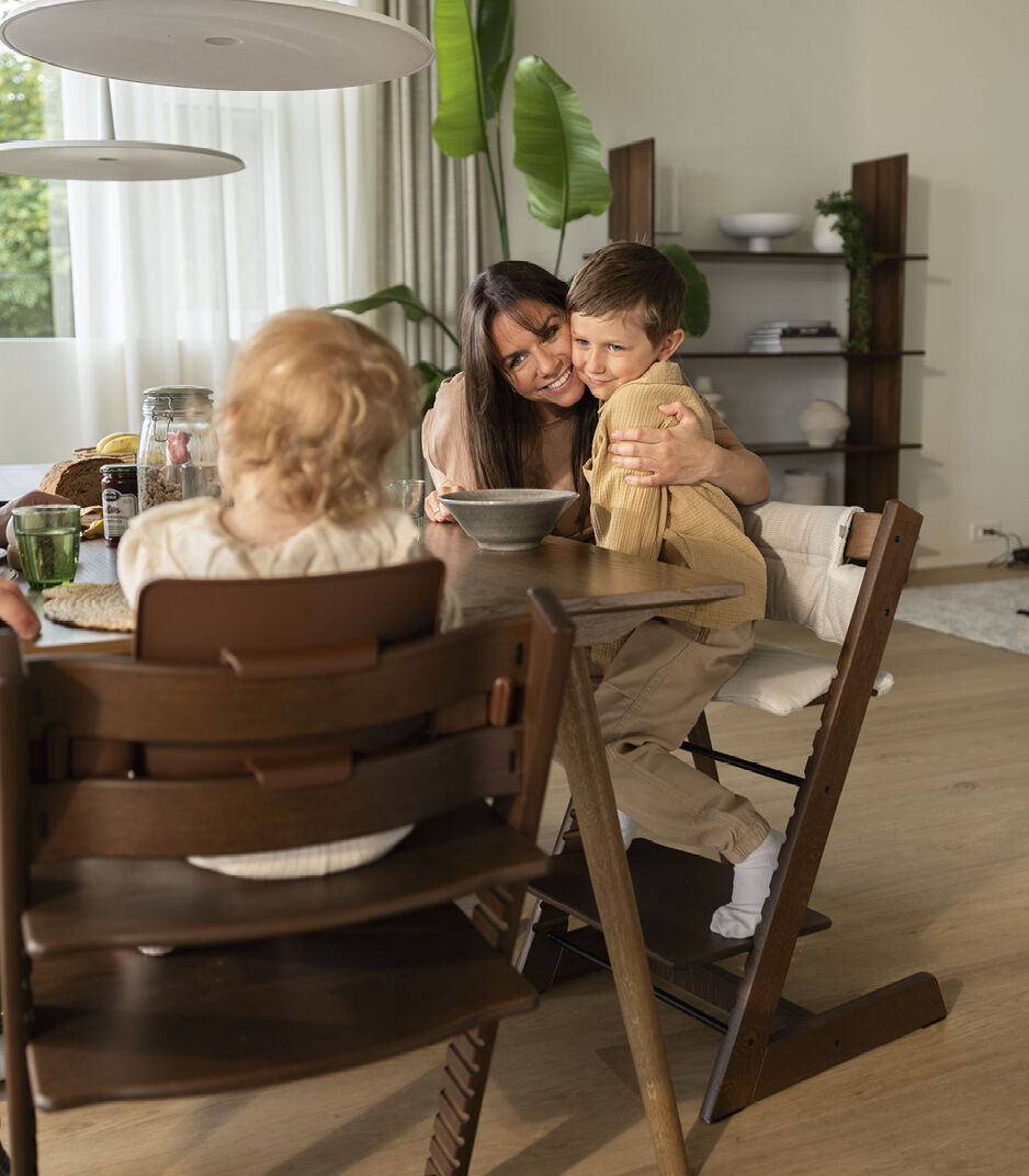 Tripp Trapp® Oak Warm Brown with Baby Set and chair with Nordic Grey Classic Cushion. galery image 4