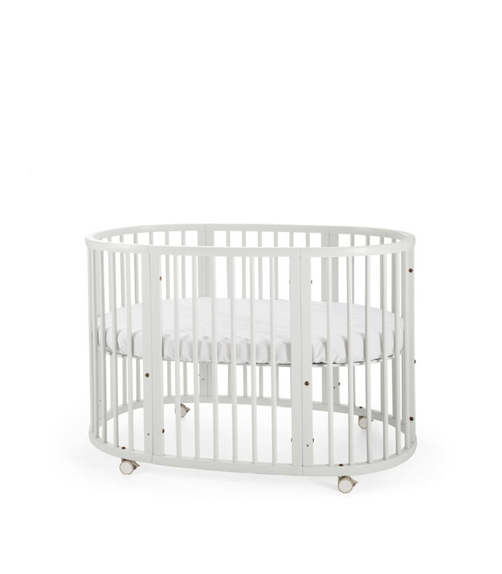 Stokke® Sleepi™ Bed. White. Mattress high. view 1