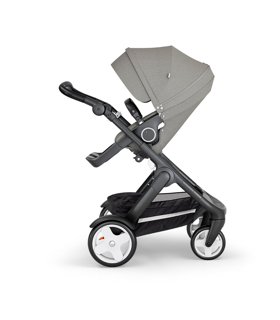 Stokke® Trailz™ with Black Chassis, Black Leatherette and Classic Wheels. Stokke® Stroller Seat, Brushed Grey. view 17