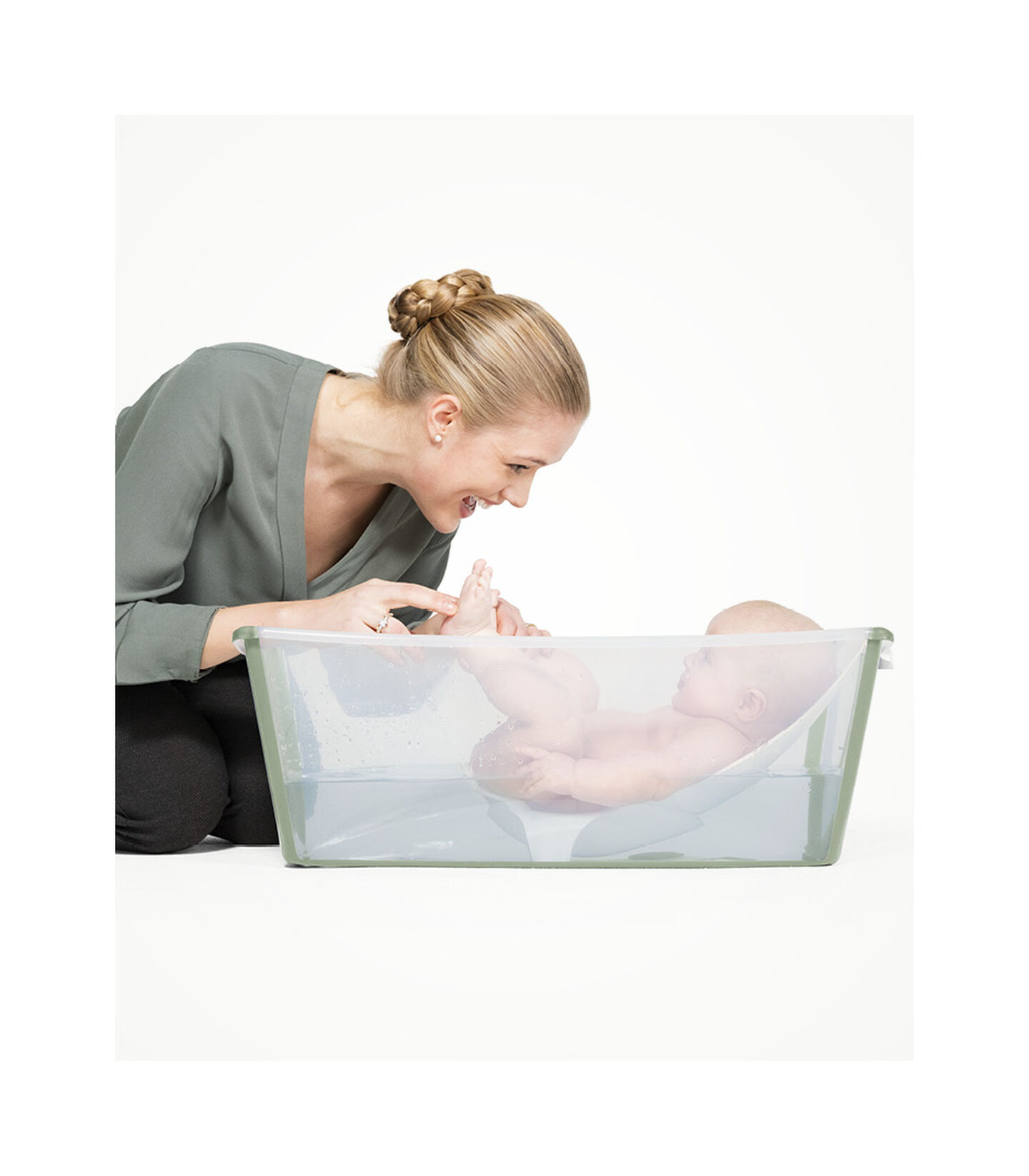 Stokke® Flexi Bath® Transparent Green. Newborn Support. view 3