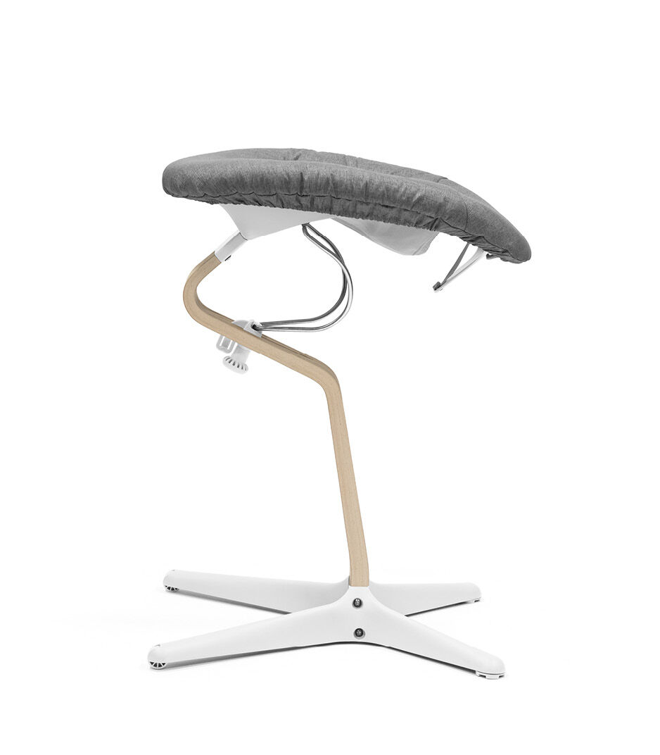 Stokke® Nomi® Chair Natural-White with Newborn Set White and Grey textile set. Rest position.  galery image 8