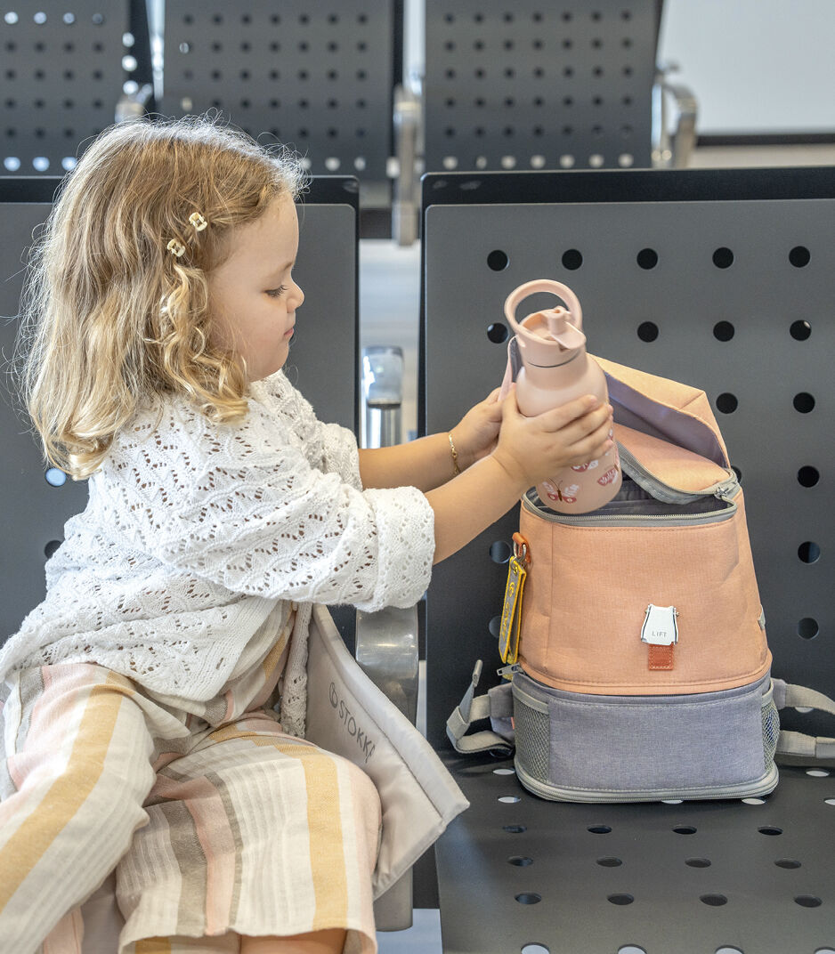 Stokke® JetKids™ BackPack. Coral pink.