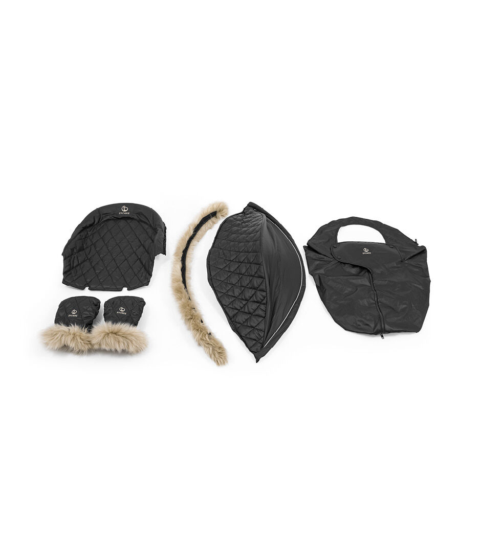Stokke® Xplory® X Winter Kit. What' s included.
Rear Seat Cover, Mittens, Canopy and Sheepskin Rim, Storm Cover. view 1