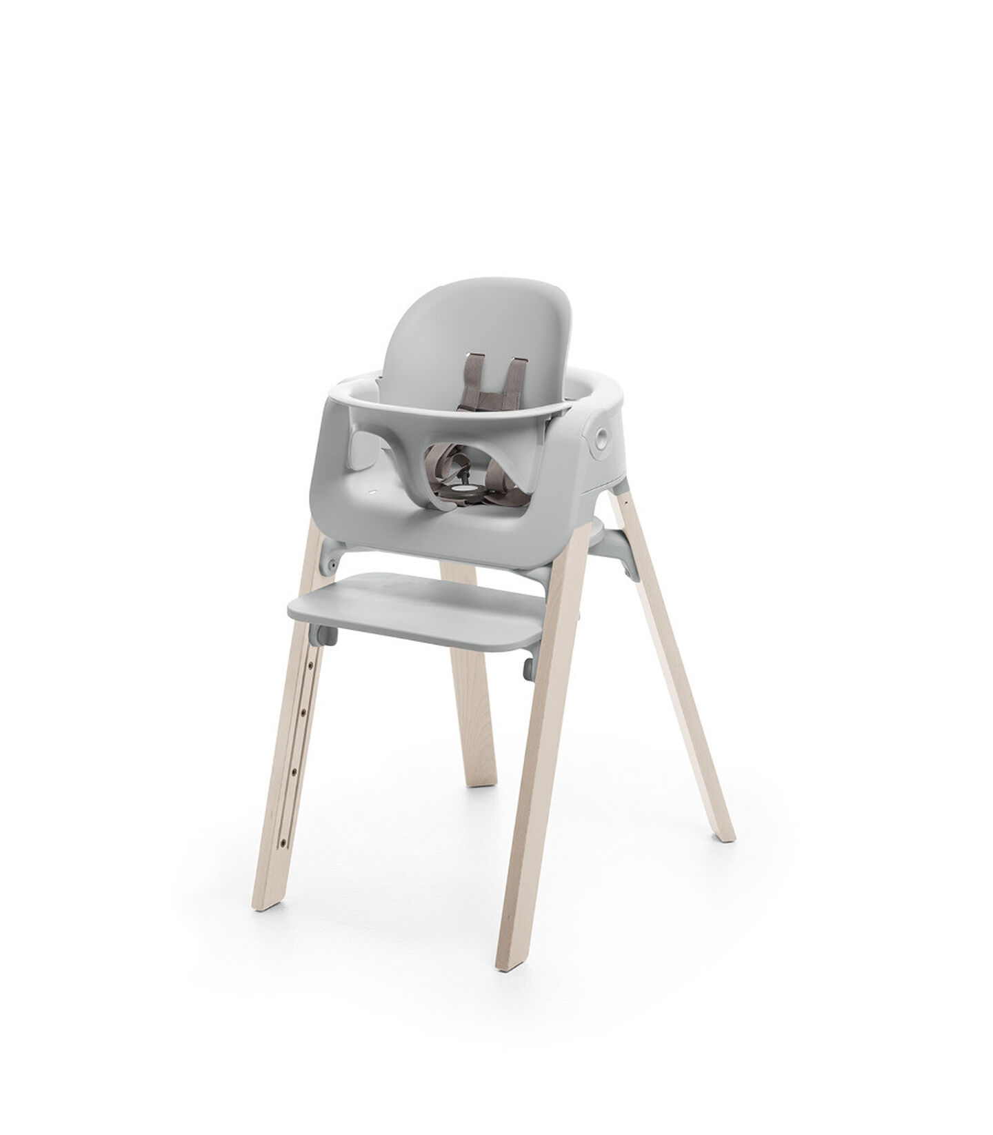 Stokke&reg; Steps&trade; Whitewash chair with Baby Set Light Grey.
