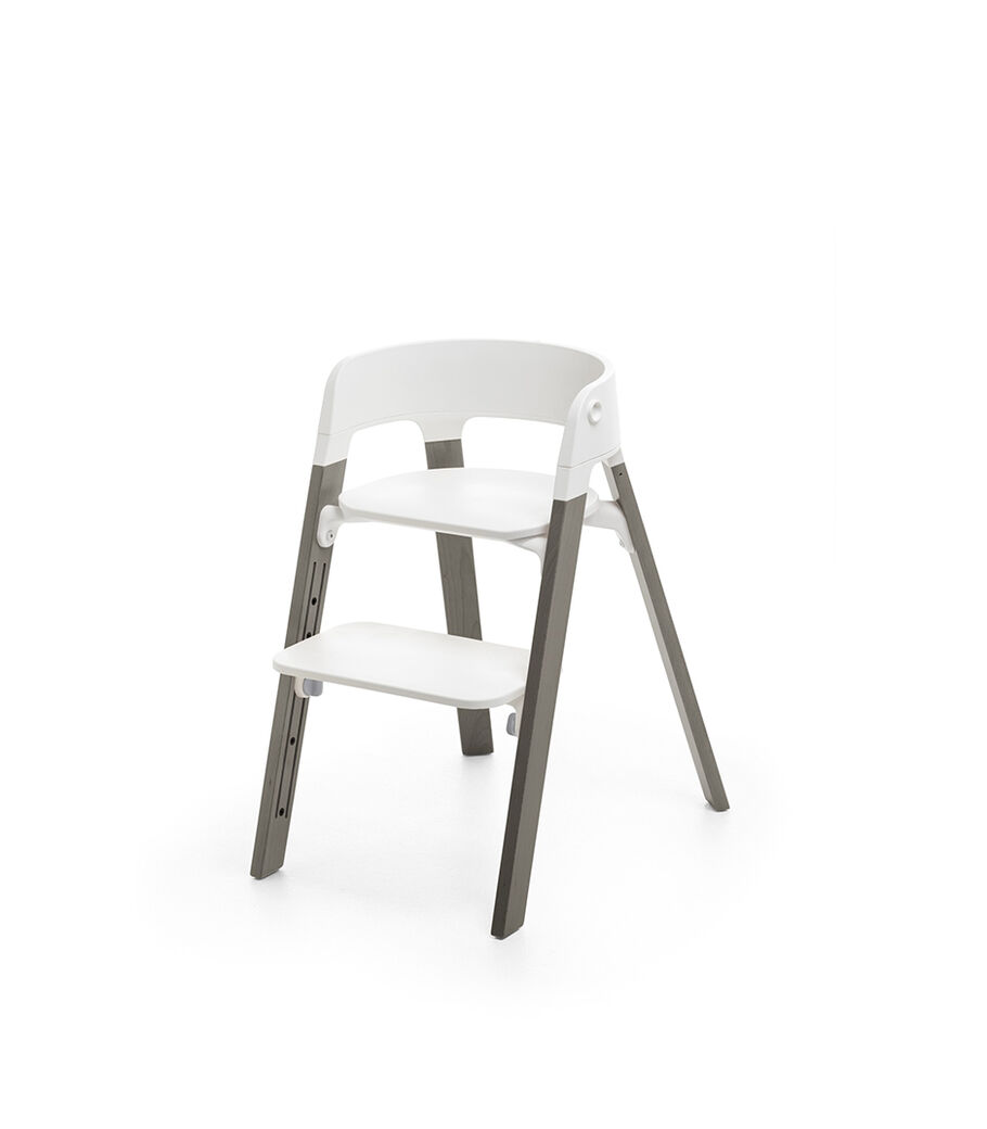 Stokke® Steps™ Hazy Grey  with white seat and footrest in high position. view 9