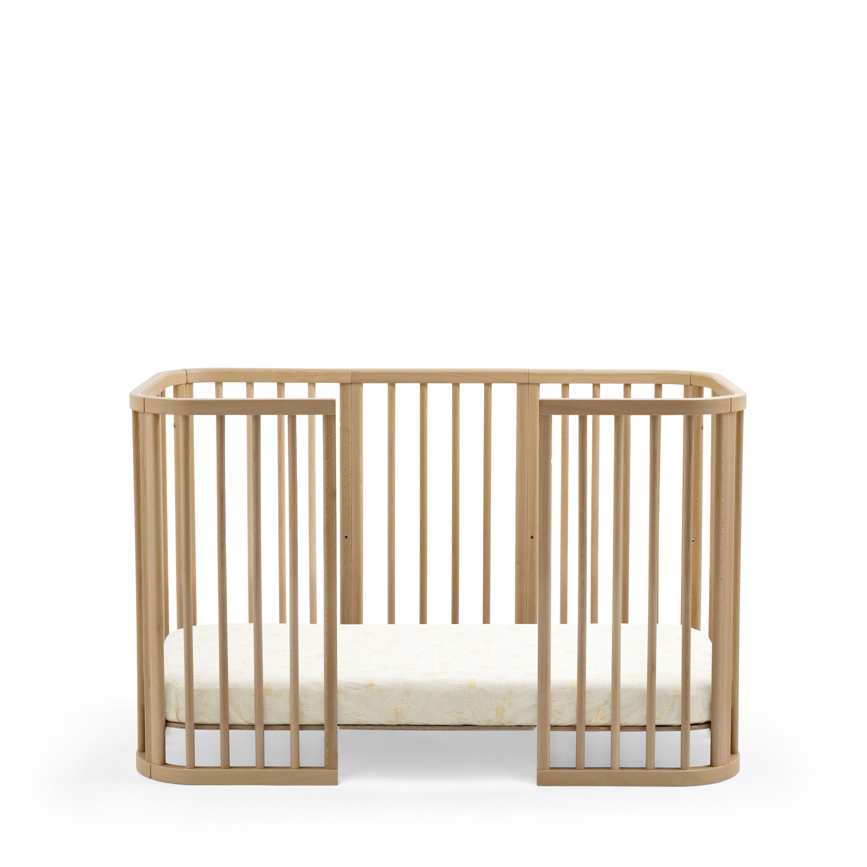 Stokke® Nighti™ Toddler config 2. Natural. Fitted Sheet Birch. Profile view.