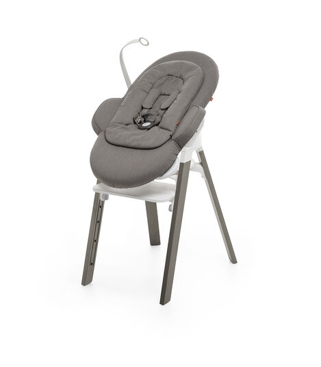 Bouncer, Greige. Mounted on Stokke Steps highchair. view 6