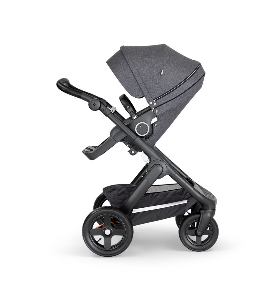 Stokke&reg; Trailz&trade; with Black Chassis, Black Leatherette and Terrain Wheels. Stokke&reg; Stroller Seat, Black Melange.