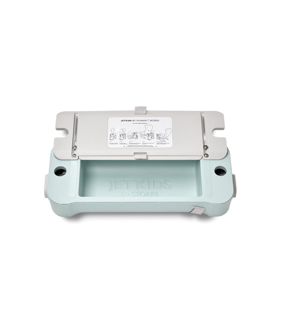 JetKids by Stokke® RideBox Green Aurora. Lid with extendable plate, open.