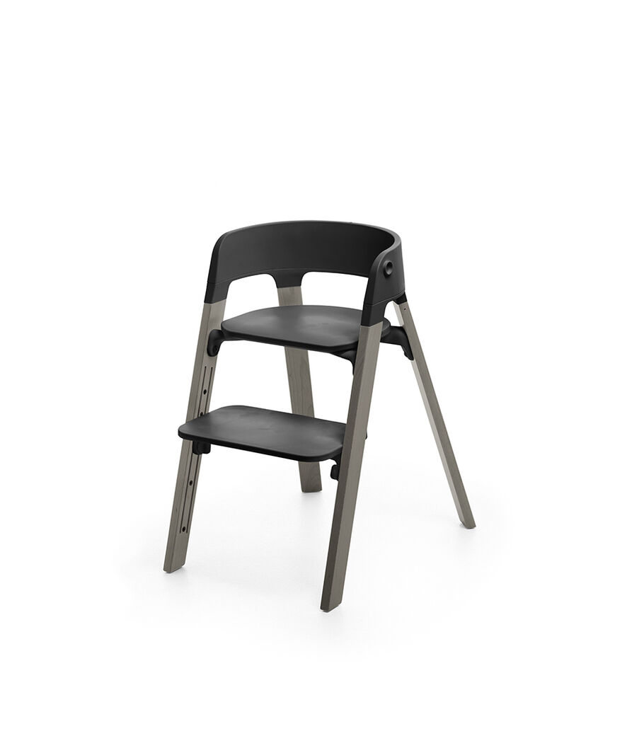 Stokke&reg; Steps&trade; Chair, Beech Hazy Grey with Black Seat. Footrest high.