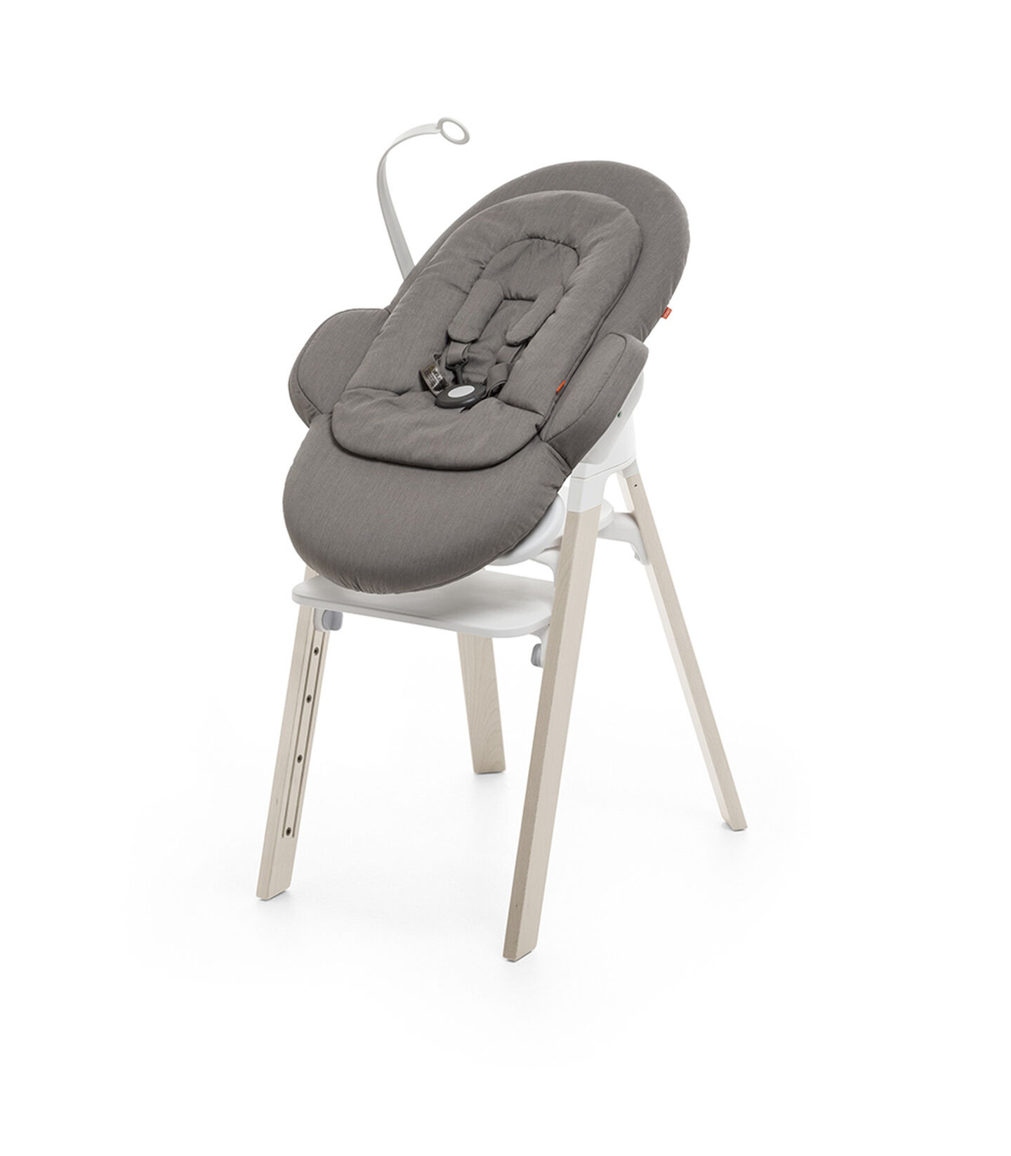 Bouncer, Greige. Mounted on Stokke Steps highchair.