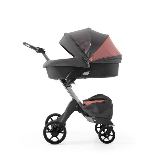 Stokke® Xplory® Silver Chassis and Carry Cot. Athleisure Coral. view 6